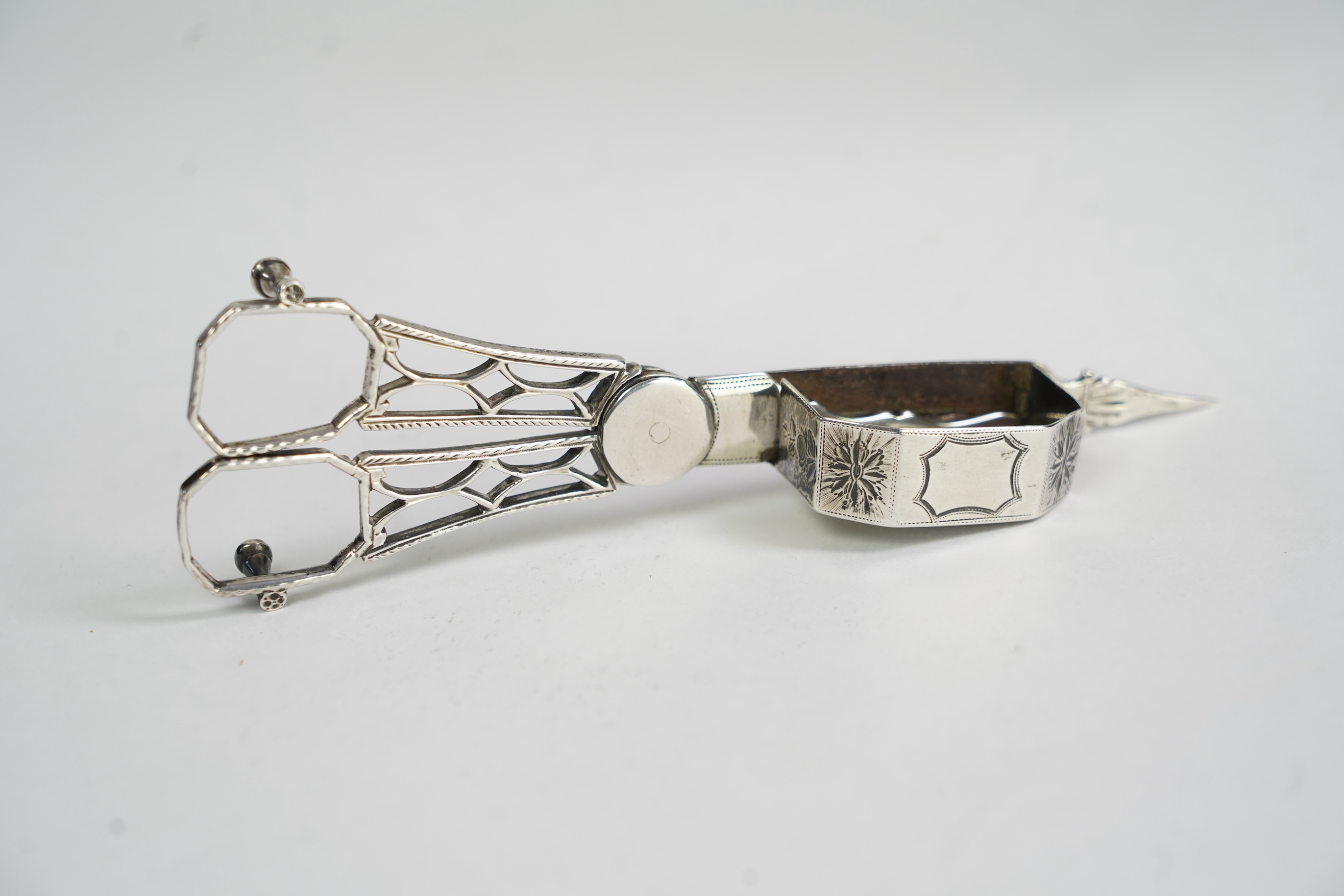 A set of twelve George III silver Hanoverian pattern table spoons by Walter Tweedie, the terminals engraved with the family crest of The Right Reverend Robert Lowth, Bishop of London, (1710-1787)